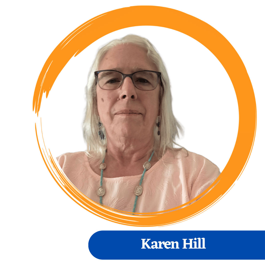 Karren Hill with shoulder length white greyish hair wearing glasses, peach cream top and long necklace around her neck.